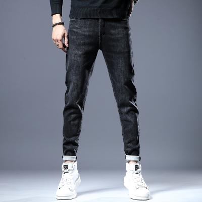 China QUICK DRY Mens Designer Tapered Jeans Embroidery Black Denim Pants Shapes Mens Clothing For Hip Hop Skinny Male Male Streched Jeans for sale