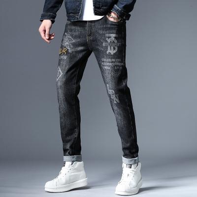 China QUICK DRY Mens Designer Tapered Jeans Embroidery Black Denim Pants Shapes Mens Clothing For Hip Hop Skinny Male Male Streched Jeans for sale