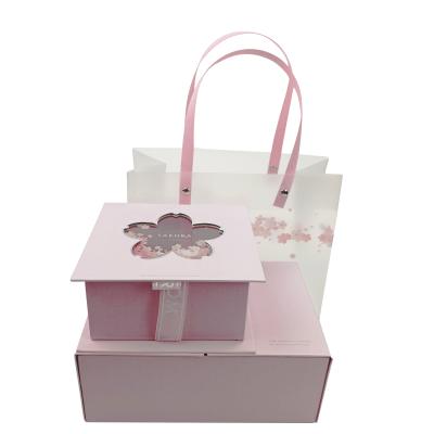 China Beautiful Recyclable Custom Pink Gift Box With Clear Window For Girls Perfume Cosmetics Gift Box And Bag Set for sale