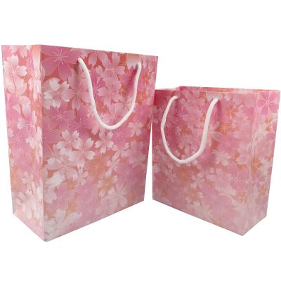 China Wholesale High Quality Pink Recyclable Custom Design Shopping Paper Bag With Own Logo for sale