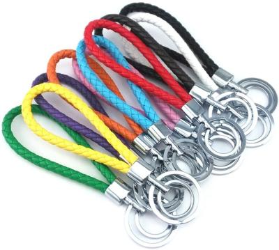 China Modern Custom Fashion Custom Men's Women's Multicolor Handmade Alloy Car Hanging Belt Rope Braided Leather Rope Key Chain for sale