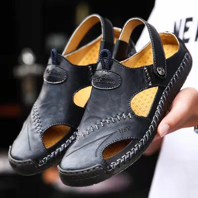 China Flat 2022 new wholesale men's plus size men's beach sandals 35-48 slippers for sale