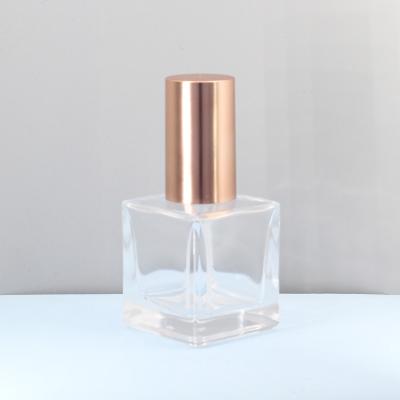 China Clear 30ml Base Pump Square Cosmetic Packaging Containers Luxury Glass Cosmetic Bottle for sale