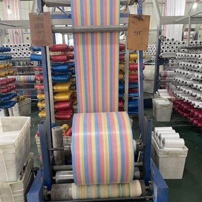 China Moisture Proof Colored PP Woven Fabric / Roll 25-150cm for sale