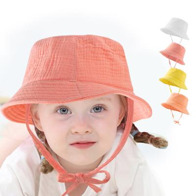 China Wholesale Unisex Outdoor Summer UV Toddler Unisex Outdoor Cotton Solid Color Crepe PROTECTION RTS Adjustable Hats With Strap Baby Bucket Hat for sale