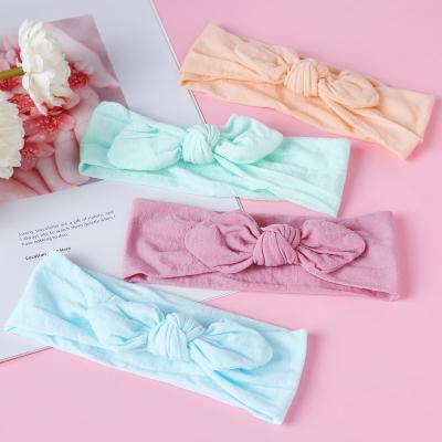 China Hair Decoration 35 Colors Soft Hair Accessories Nylon Elastic Knotted Bunny Ear Baby Knot Top Headband for sale