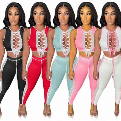 China 2021 New Arrival Breathable 2 Piece Pants Set Women Hollow Out Overalls Bandage Top Women's Pants Two Piece Set Clothing for sale