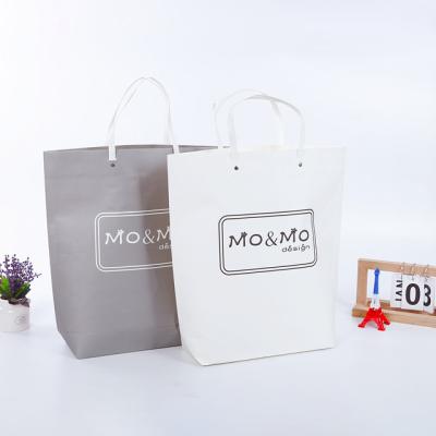 China Recyclable Recycled Kraft Paper Preprint Customize Logo Clothing Shopping Paper Handbag for sale