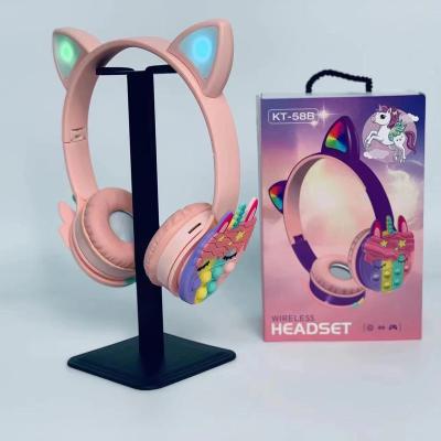 China Cat Ear Unicorn Girls Bubble Wireless Headset Silicone Push Earphone KT-55B Hot Jumping Person Moving Headset Earphone For Kids for sale