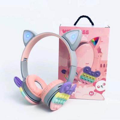 China KT-58A Earphone Trigger Wiggle Toy Gift Wireless Earbuds Push Bubble Cat Ear Wireless Earphone Cute LED Kids Support Headphones for sale