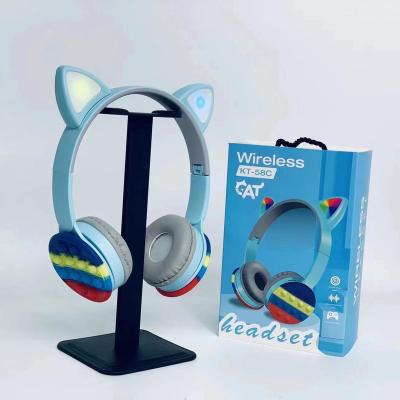 China KT-58C 2022 new arrivals silicone headband popping popping bubble wiggle wireless LED kids earphones cat ear earphones relax headphones for sale