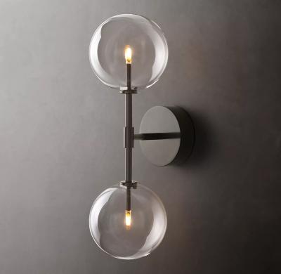 China Modern glass globe candle holder villa hotel modern design wall lamp simple black linear sconce for sale