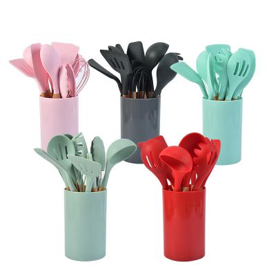 China 2021 Hanging Cocina Handle Spatula Nordic Viable Spoon Tongs Hole Cooking Kitchen Utensils Supplies Silicone Wood Set for sale