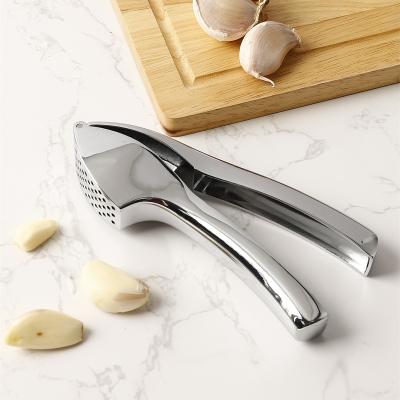 China 2022 Best Viable Manual Hand Handle Garlic Crusher Convenient Clean Silvery Zinc Alloy Press Multifunctional for sale