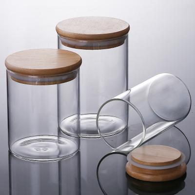 China Sustainable Home Used Borosilicate Glass Storage Jar With Bamboo Lid / Cork Lid for sale