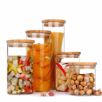 China Wholesale Glass Cover Storage Jar With Bamboo Lid For Kitchen for sale