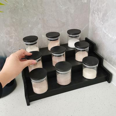 China Custom Heat Resistant Empty Container Glass Candle Jar With Black Wooden Lid for sale