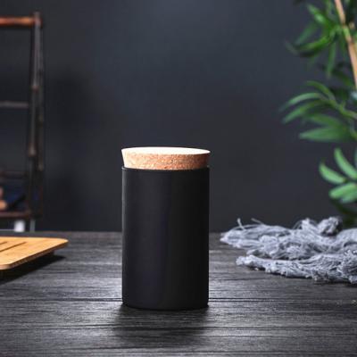 China Home Decoration Matte Frosted Black Glass Candle Jars With Cork Cover for sale