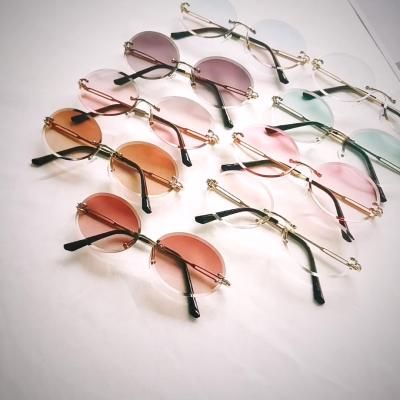 China Fashion Sunglasses Lastest Sun Glasses Combine Rimless Shades Oval Color Changing Frames Gafas De Sol Women Eyewear Metal Spectacle for sale