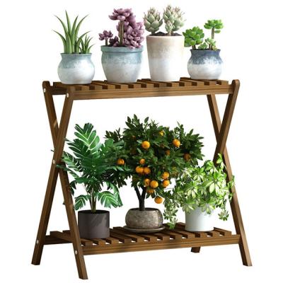 China Factory Wholesale Durable Foldable Stand Flower Shape Plant X Wooden Shelf for sale