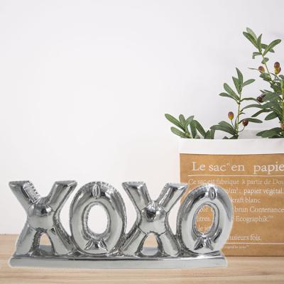 China Beautiful Colorful XOXO Ceramic Silver Plated Valentine Gift Letters Shape Table Top Centerpiece Decoration for sale