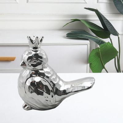 China Huifa New Design Ceramic Bird Of Electroplating Silver Ceramic Wares For Garden And Tabletop Home Decoration for sale