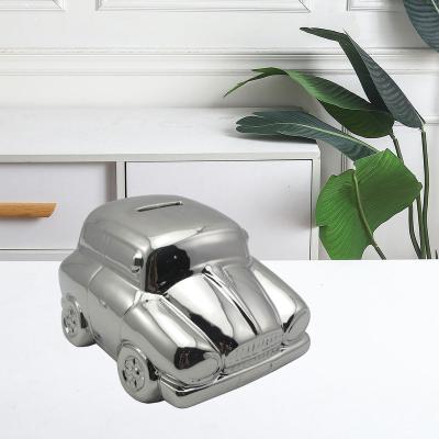 China Huifa Unique New Design Plated Silver Ceramic Piggy Bank For Kids Gifts Home Decor for sale