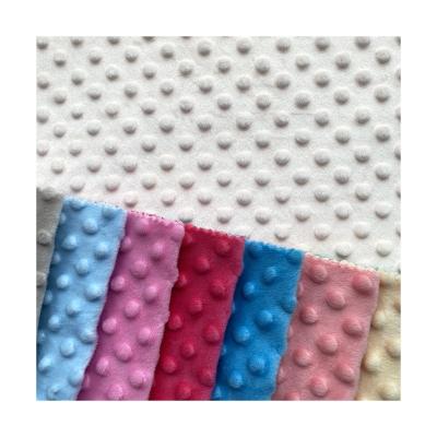 China Super Soft Super Soft Dimple Dot Minky Dot Fabric 100% Polyester Velvet For Baby Toy Blanket Wholesale Textile Fabric designer for sale