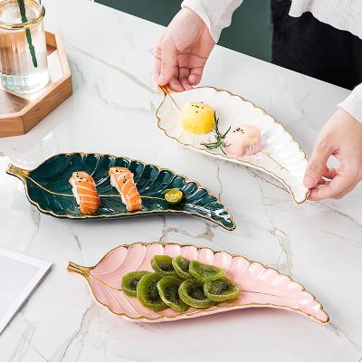 China Sustainable European Gold Rim Charger Banana Leaf Shaped Nordic Ceramic Creative Luxury Dessert Decor Japanese Dish Dinner Plate Sushi Dish for sale