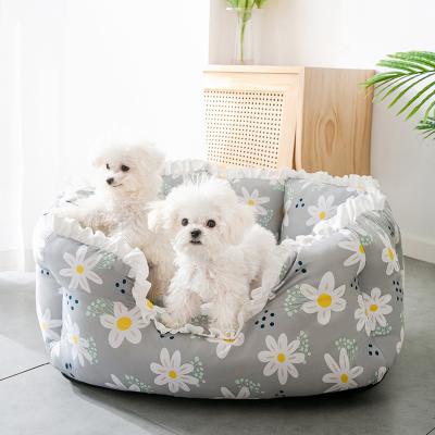 China Viable pet bed warm autumn and winter more floral down small dog kennel cat sofa bed kennel pet supplies for sale