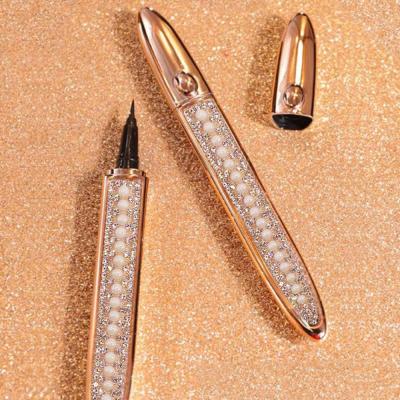 China Eyes Wholesale Clear Glitter Lashes Pen And Magic Eyeliner Glue Pen for sale