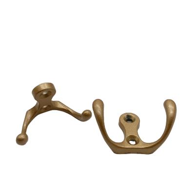 China Hot Selling Zinc Alloy Cabinet Stocked Furniture Hardware Clothes Hook Sand Gold Double Hook Coat Hook for sale