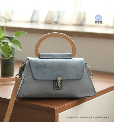 China Water Resistant Leather Handbags Fashion Tote Bucket Bags Scare Leather Shoulder Bags For Women for sale