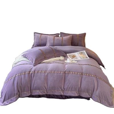 China New Class Nondisposable A High Gram Jacquard Embroidery Craft Heavy Milk Velvet Four Piece Bedding Set for sale