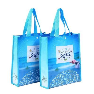 China Hot Selling Handled Customized Printing Extra Large Reusable Shopping Tote Bag Recyclable Laminated PP Woven Bag for sale