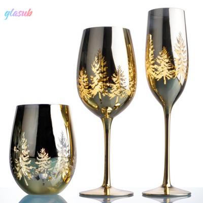 China Factory direct creative elegant skeleton plating Christmas tree pattern stem gold red wine glass along to wedding decoration for sale