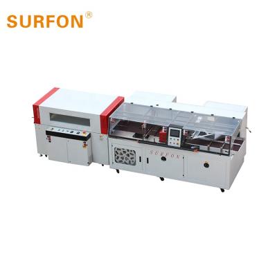 China CLOTHING Comics Magazine High Speed ​​Shrink Wrapping Wrapping Packaging Machine for sale