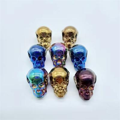 China Jiangsu Wholesale Natural Plating Rainbow Plating Stone Skulls Decoration Gift For Necklace for sale