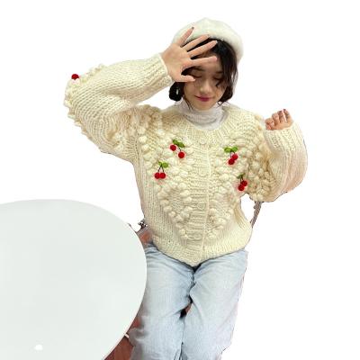 China Anti-wrinkle fashion hand knitting cotton crochet women vintage warm thick cardigan custom embroidered tassel fuzzy sweater for sale