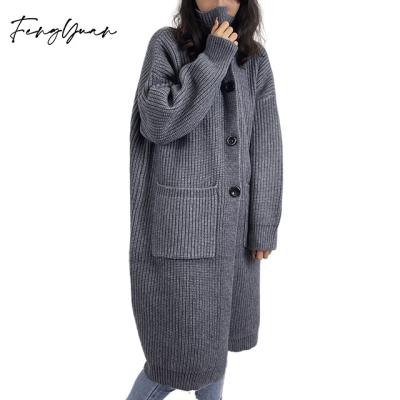 China Anti-wrinkle knitwear manufacturers wholesale warm winter stripe knitted cashmere cardigan women long with pocket for sale