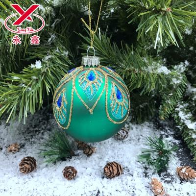 China Hand Painted Christamas Tree Decoration Peacock Feather Christmas Glass Ball Decoration for sale