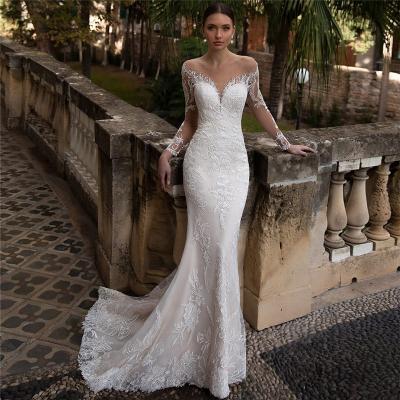 China New Arrival Anti-Static Long Sleeve Lace Appliqued Back Bridal Gowns Sheath Illusion Wedding Dresses for sale