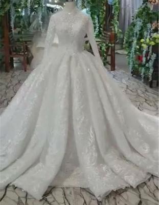 China Luxury Anti-Static Sleeve Beading Wedding Ball Gown Lace Long Sleeve Muslim Wedding Dress High Neck for sale