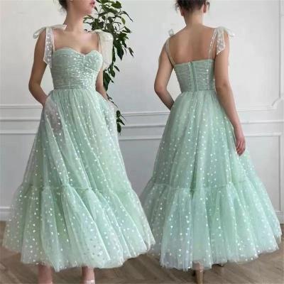 China Anti-wrinkle Fashion A Line Mint Green Dot Star Bow Spaghetti Strap Prom Dresses Tea Length Tulle Party Gowns for sale