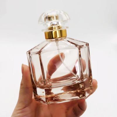 China Eco-friendly Recyclable In Stock Cosmetic Packaging Luxury Empty Glass 100ml Perfume Bottle With Mist Sprayer Pump for sale