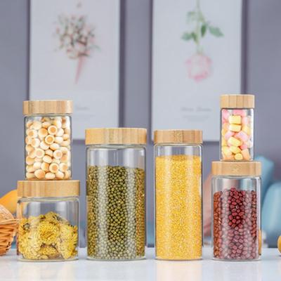 China Freshness Preservation High Borosilicate Glass Storage Jar Kitchen Food Container For Fruit Coffee Bean Canisters With Screw Wooden Dry Lids for sale