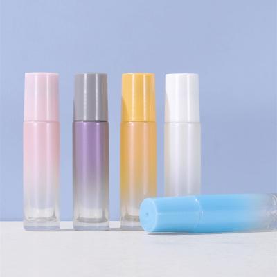 China 5ml 10ml Cosmetic Wholesale Color Spraying Essential Oil Glass Reusable Round Roller Bottle for sale