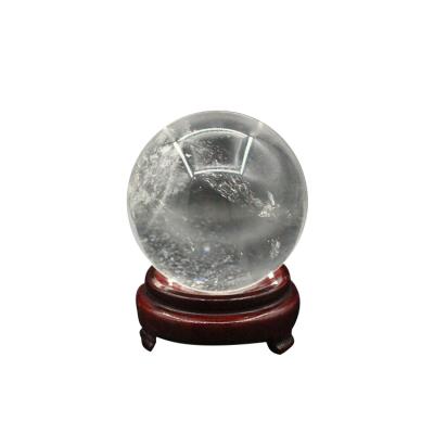 China Professional Made China Quartz Crystal Ball Rock Clear Crystal Rainbow Spheres With Stand Base for sale