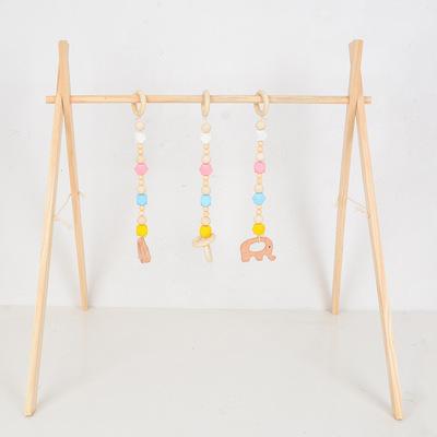 China Comfortable Wooden Baby Gym With 4 Sets Wooden Frame Foldable Activity Gym Play Gym Baby Toys Newborn Baby Gift for sale