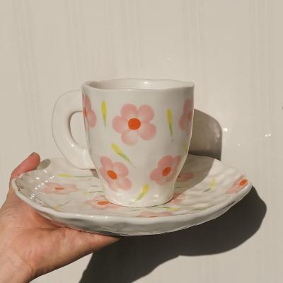 China Viable Handmade Irregular Hand Painted Flower Ceramic Mug Hot Selling INS Style Viable Ceramic Flower Mug for sale